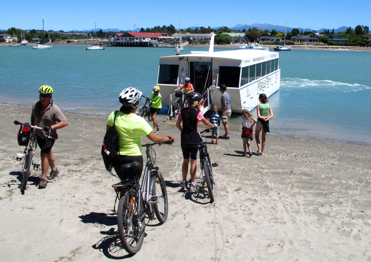 Cross from Rabbit Island on cycle ferry to Mapua